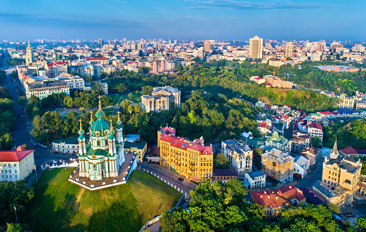 Aerial view of Saint Andrew church and Andriyivskyy Descent, cityscape of Podil. Kiev, Ukraine