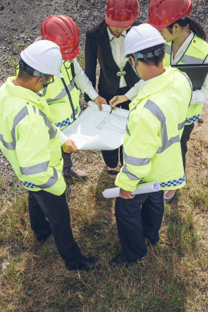 istock Team spirit of engineers and technicians 985998796