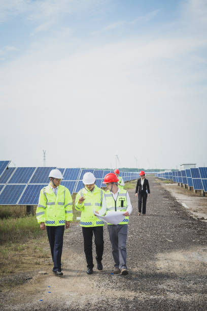 istock Engineers discuss the survey at the green energy base 985998812