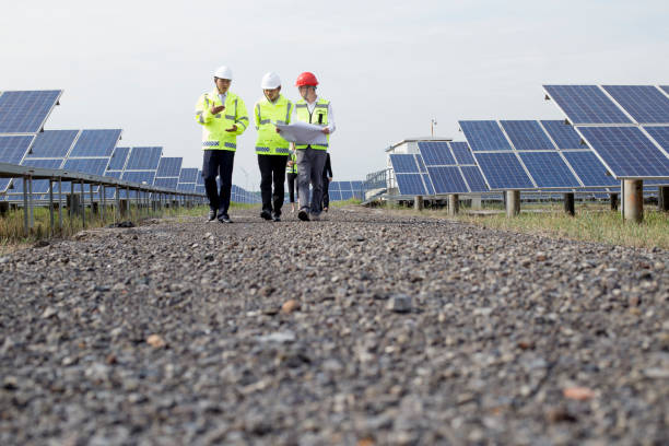istock Engineers discuss the survey at the green energy base 985998814