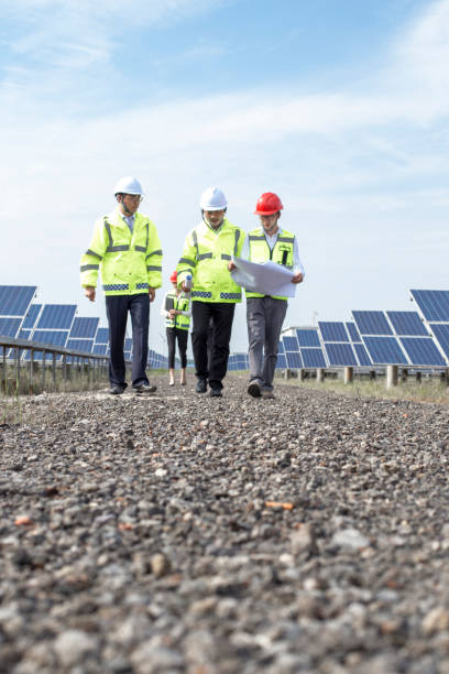 istock Engineers discuss the survey at the green energy base 985998820