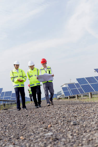 istock Engineers discuss the survey at the green energy base 985998868