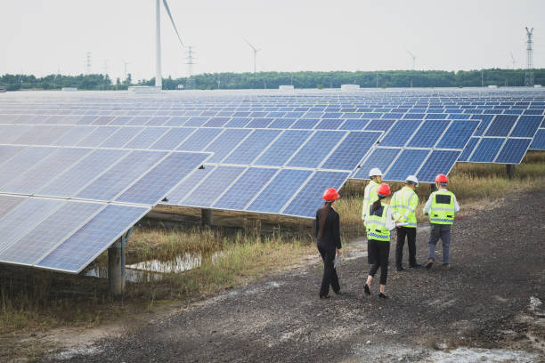 istock Engineers and technicians on-site survey at new energy base 985998988