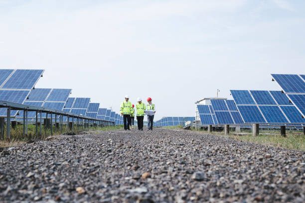 istock Engineers discuss the survey at the green energy base 985999012