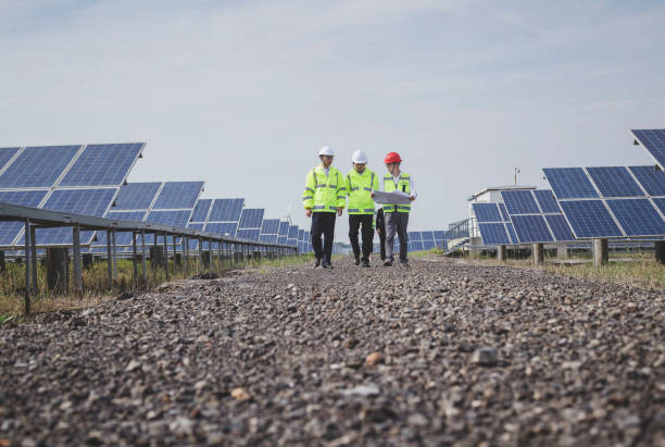 istock Engineers discuss the survey at the green energy base 985999026