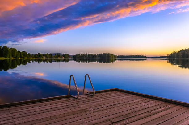 istock Summer night lake view from Sotkamo, Finland. 985999536