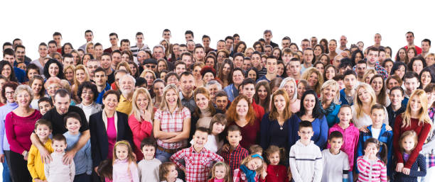 istock Large group of happy people looking at camera. 986000070