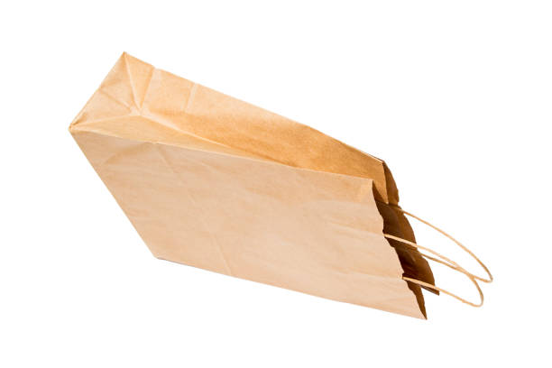 istock Paper bag with handles isolated on white 986015142