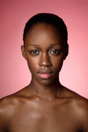 Portrait of young woman with bare shoulders photo