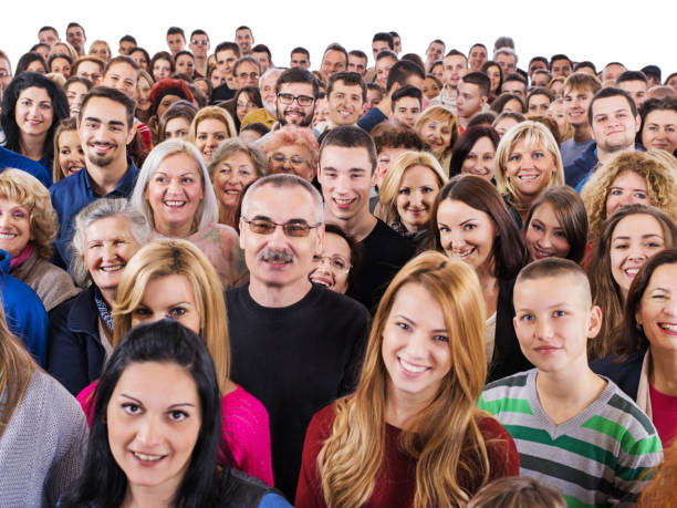 istock Large group of happy people isolated on white. 986020752