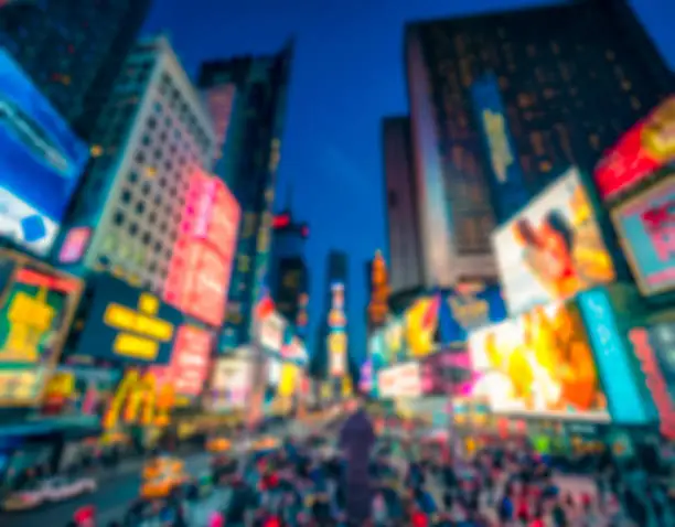 Photo of Times Square defocused at dusk