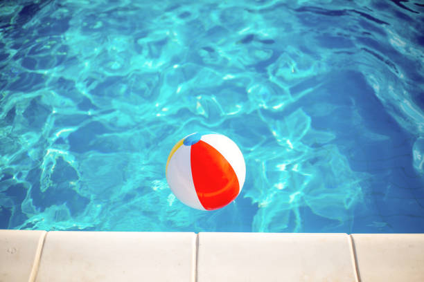 istock Ball at the swimming pool 986032220