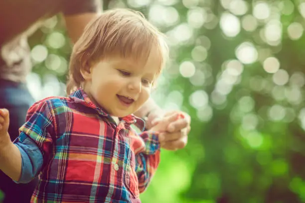 Photo of First steps in summer in park