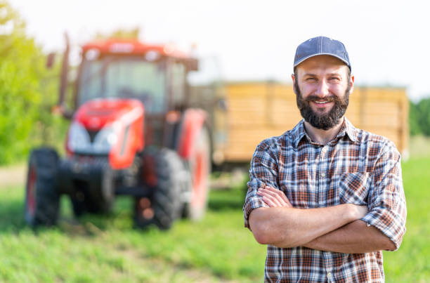 istock Farmer standing with arms crossed 986037172