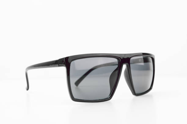 istock Black Elegant Sunglasses Close Up On White Background With Lens Reflections Eyewear Concept 986051022