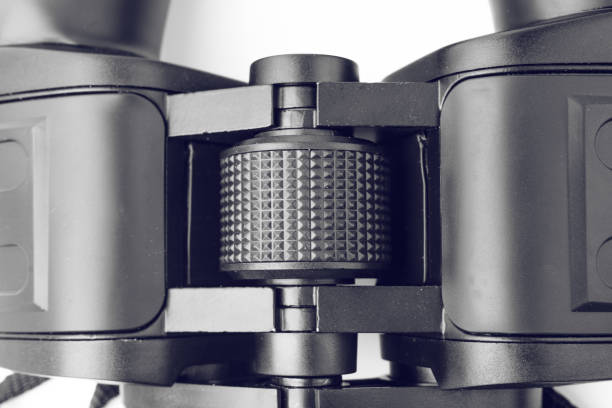 istock Close Up Of Black Binoculars With Big Reflective Lenses On Plain White Background 986051334