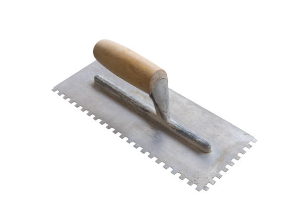 istock trowel comb isolated on white background 986056410
