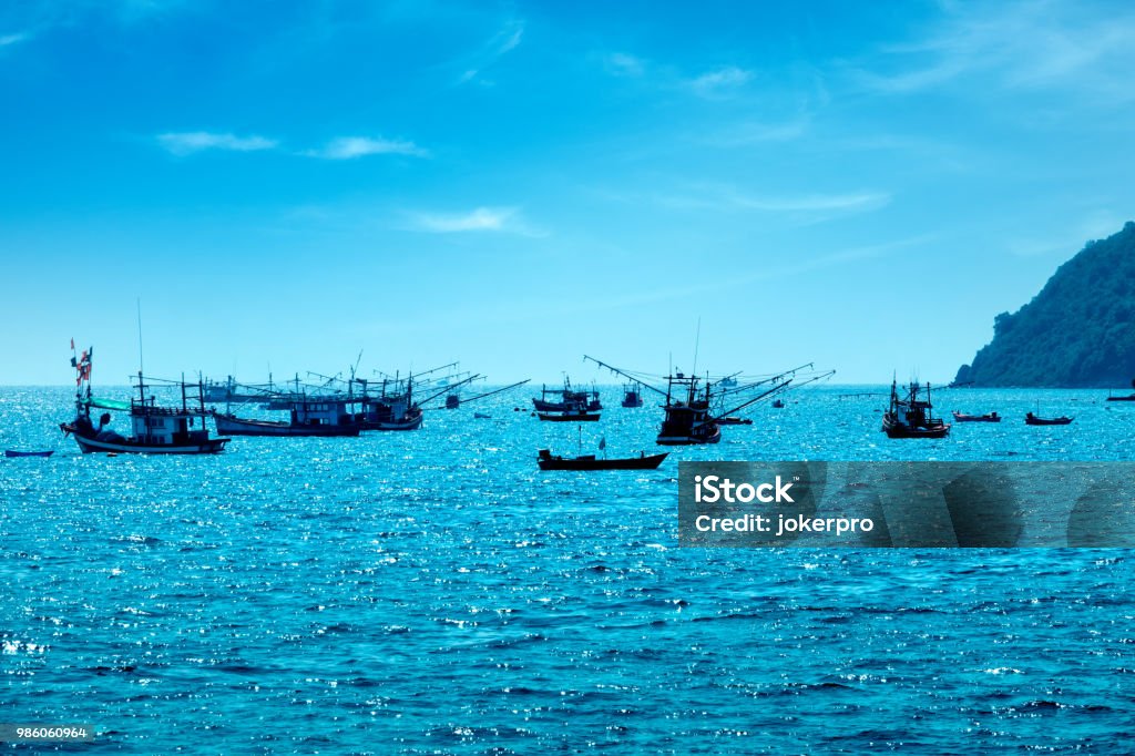 Traditional fishing boats on Gulf Of Thailand sea Traditional fishing boats on Gulf Of Thailand sea in island of Pattaya, Thailand Asia Stock Photo