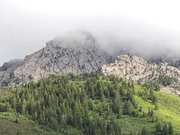 Mountain disappears into cloud