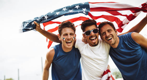 istock american supporter with flag 986110646