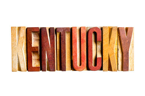 KENTUCKY  state name printed with 100+ year old letter wood blocks, isolated on white