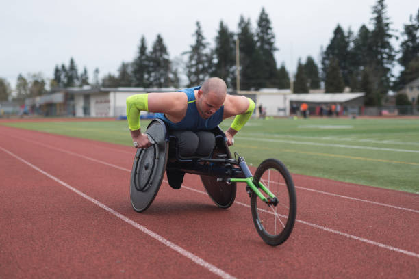 istock Adaptive athlete training on his racing wheelchair 986154134