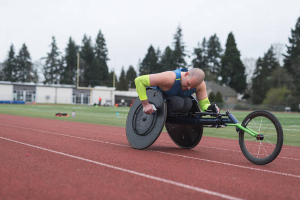 istock Adaptive athlete training on his racing wheelchair 986154146