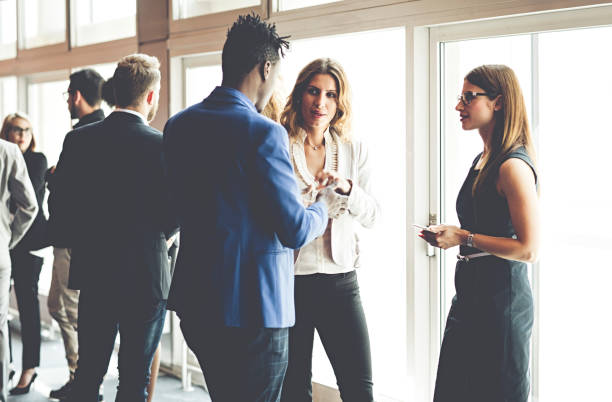 istock Business People at a Conference Meeting Standing 986154736