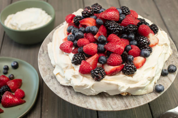 istock Pavlova Meringue Dessert Made With Berries 986154738