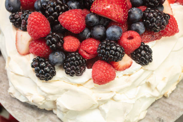 istock Pavlova Meringue Dessert Made With Berries 986154740