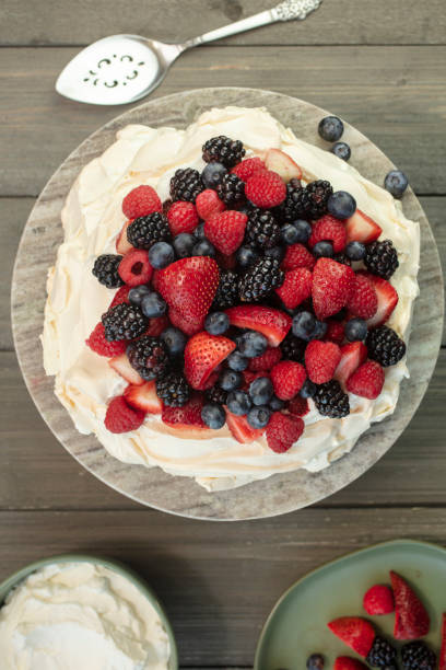 istock Pavlova Meringue Dessert Made With Berries 986154750