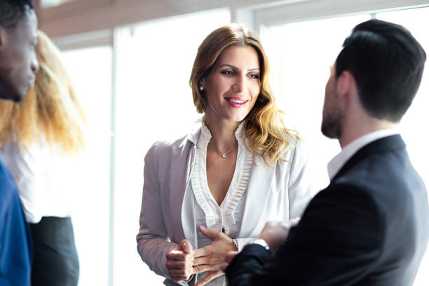 istock Business People at a Conference Meeting Standing 986154818