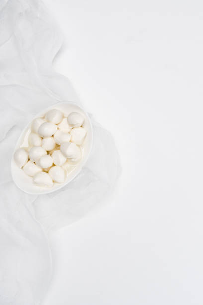 istock top view of delicious mozzarella cheese curds on white surface 986154866