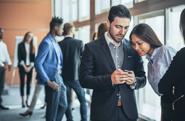 istock Business People at a Conference Meeting Standing 986157422