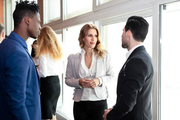 istock Business People at a Conference Meeting Standing 986157562