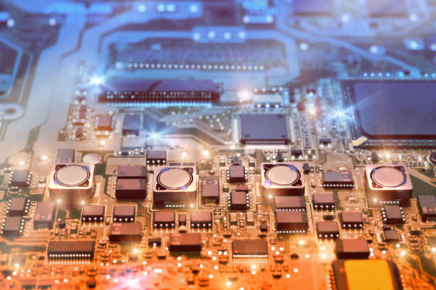 istock Closeup on electronic board in hardware repair shop, blurred and toned image 986187870