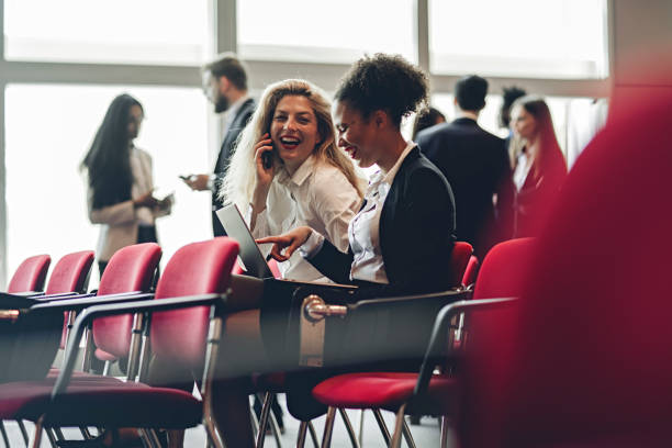 istock Business Woman at a Conference Meeting Working With Computer 986195868