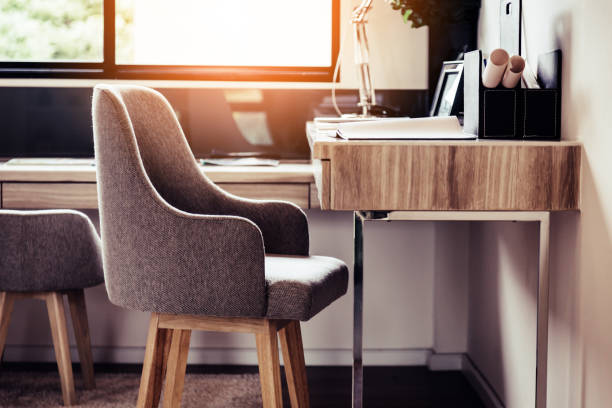 istock fabric modern chair with table working at home concept ideas 986207576