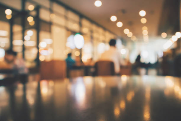 istock Restaurant cafe or coffee shop interior with people abstract defocused blur background 986213622