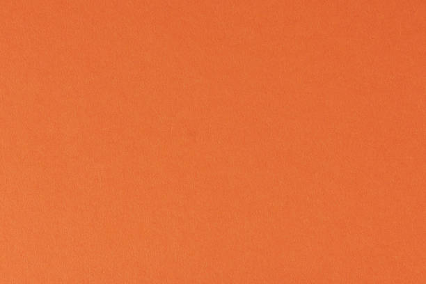 istock Surface of orange color paper 986214620