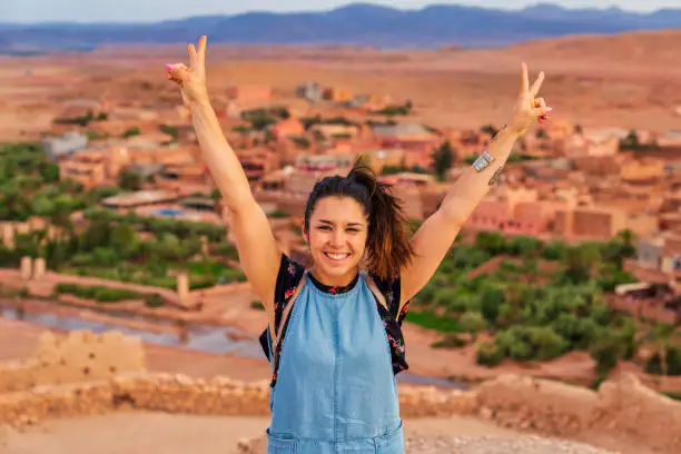 Young tourist visiting Ait Benhaddou - Ancient city in Morocco North Africa