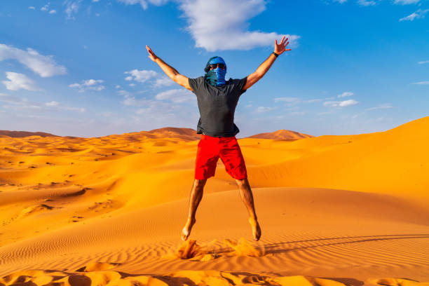 istock Tourist in the Sahara Desert Morocco 986298066