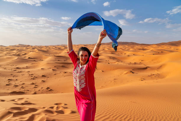istock Tourist in the Sahara Desert Morocco 986298196