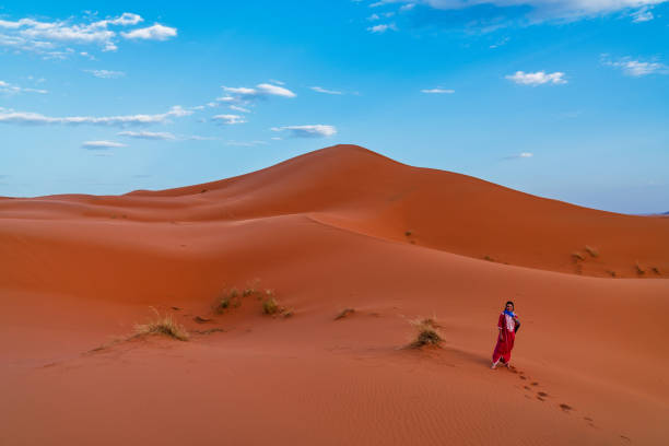 istock Tourist in the Sahara Desert Morocco 986298556