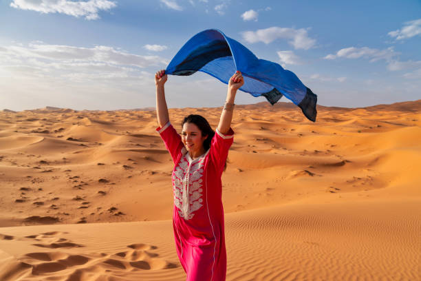 istock Tourist in the Sahara Desert Morocco 986298660