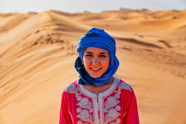 istock Tourist in the Sahara Desert Morocco 986298730
