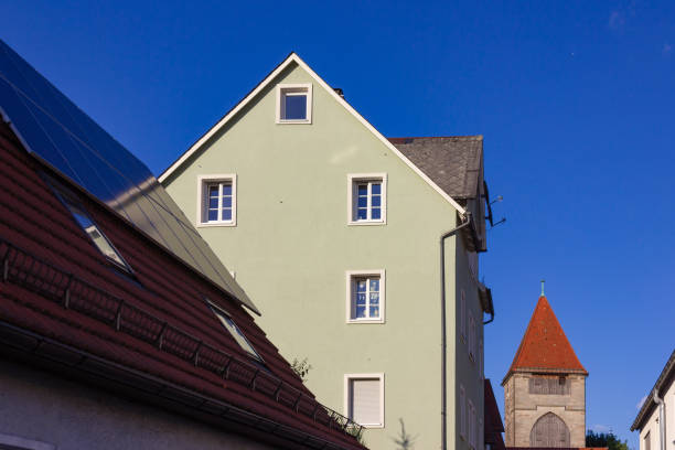 istock blue sky city facades and rooftops 986353114