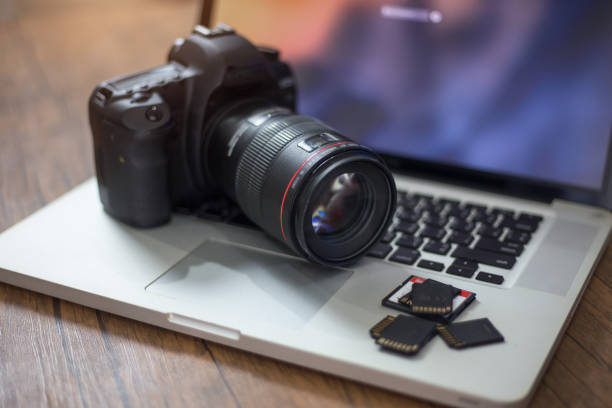 istock Digital photography workstation, Laptop computer and display. 986368662