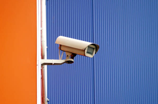 istock Camera surveillance on the wall of the building 986376684
