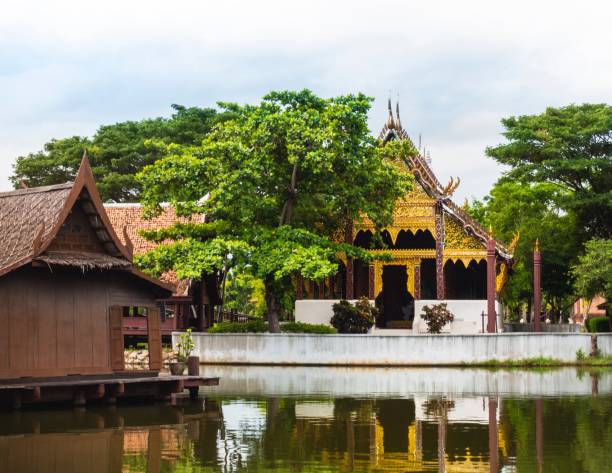 istock Buddhist Temple At Thai Floating Market 986387550